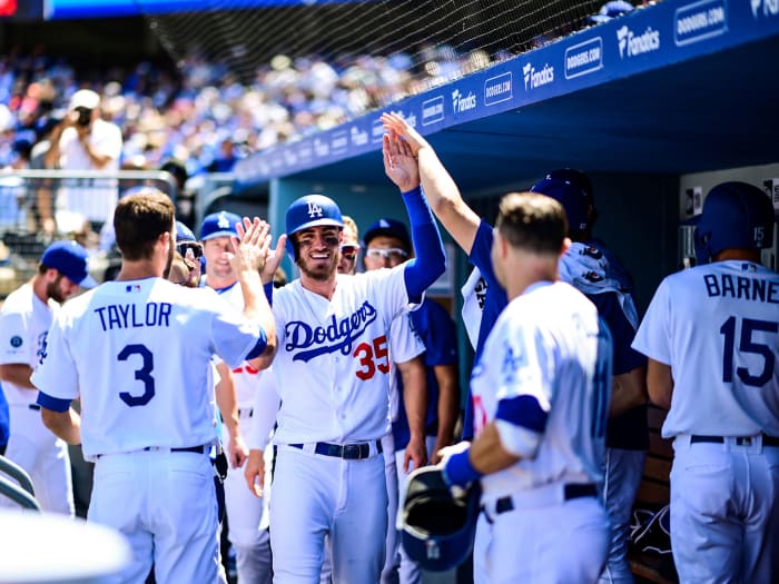 Cody Bellinger high-fives Dodgers teammates